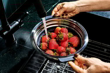 strawberries in a steamer basket