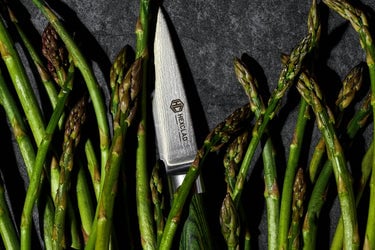 asparagus with a sharp knife