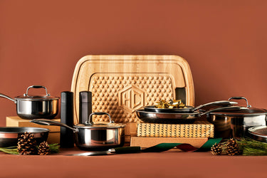 cutting board, pans, salt and pepper mill with a holiday theme