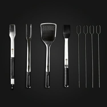 The HexClad BBQ Tool Set, 8pc, against a black background.	