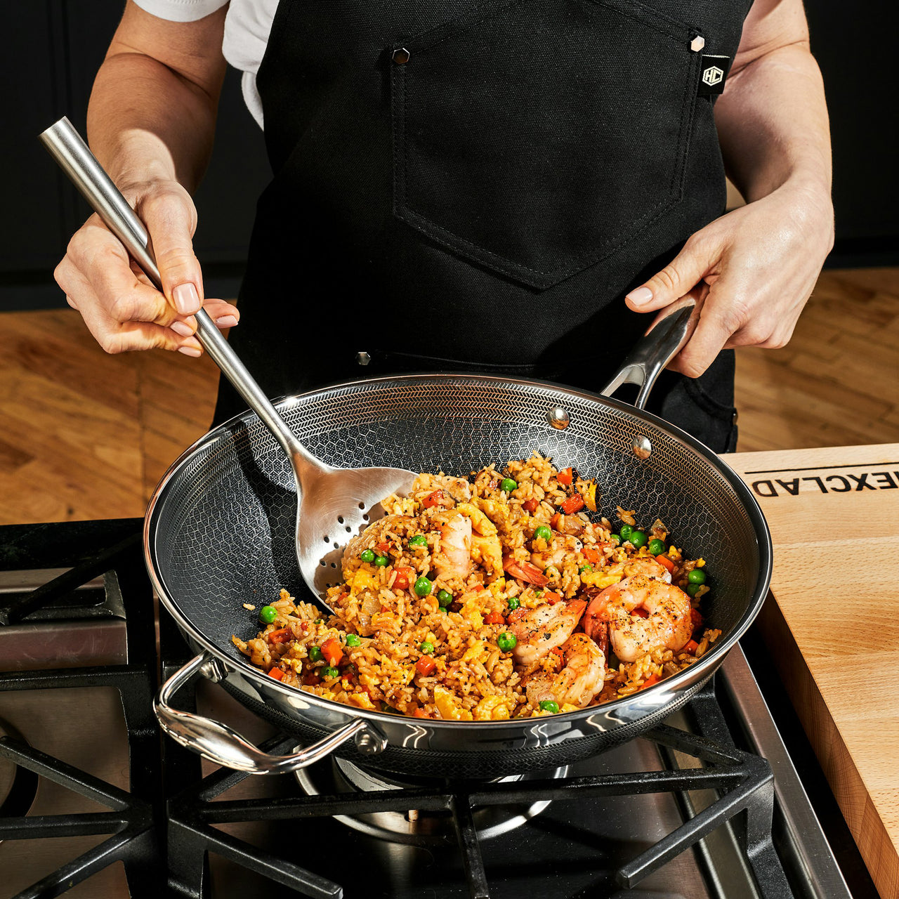 Fried rice being made in the HexClad 12' stainless steel wok
