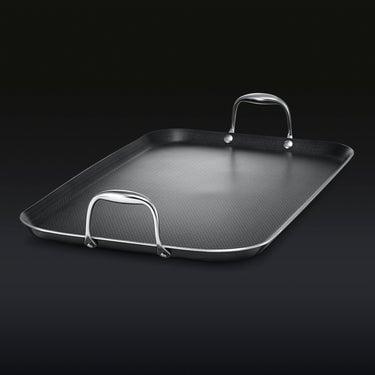 The HexClad Hybrid Double Burner Griddle on a black background.