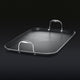 The HexClad Hybrid Double Burner Griddle on a black background.