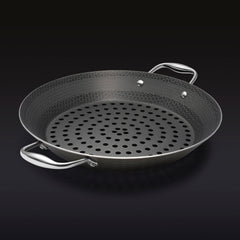 The HexClad 12&quot Hybrid BBQ Grill Pan on a black background