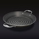 The HexClad 12&quot Hybrid BBQ Grill Pan on a black background