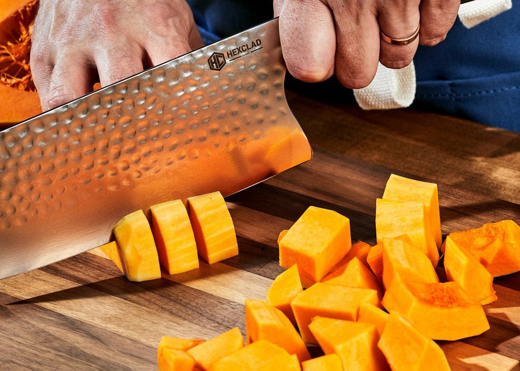 Squash getting chopped up with Cleaver Knife