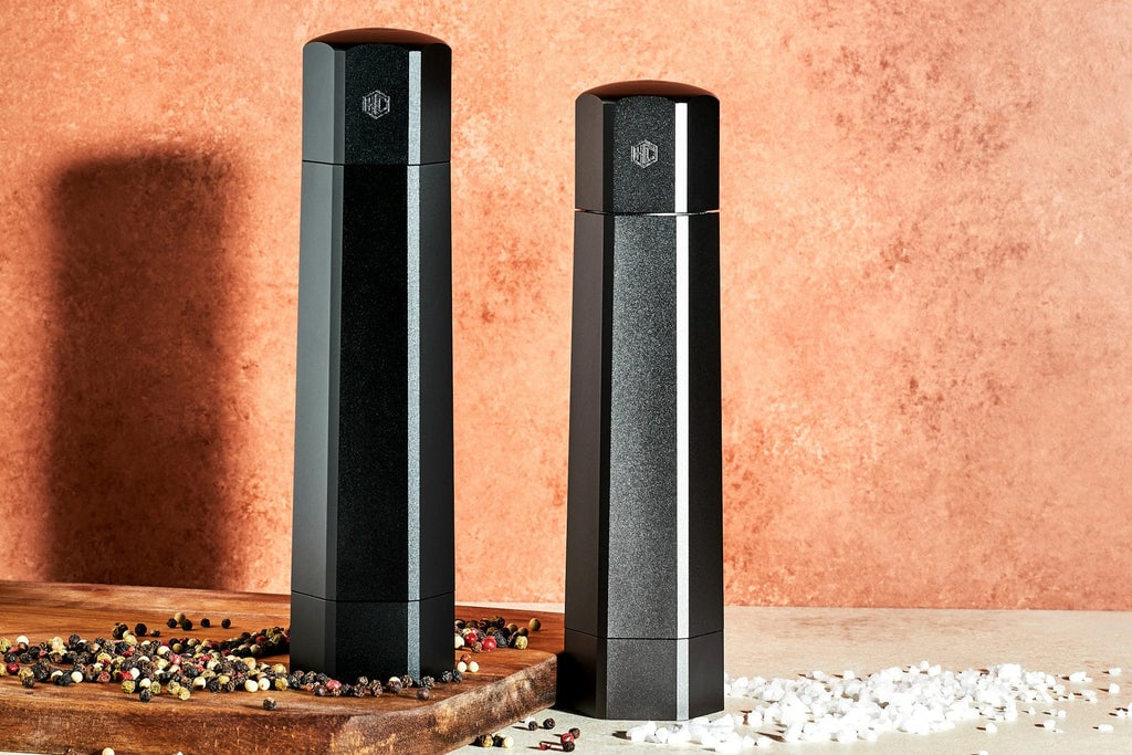 Salt and Pepper Hexmills against a pink background