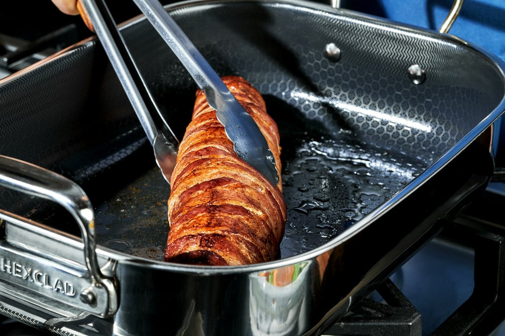 Bourbon-Glazed, Smoky Bacon-Wrapped Pork Tenderloin being seared